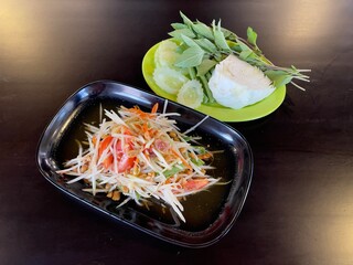 Som tam or Thai green papaya salad, famous Thai food