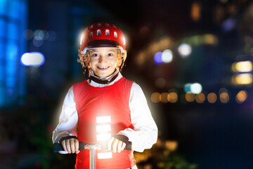 Safety on dark street. Kids reflective vest.