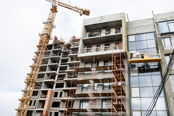 Scaffolding surrounding house development for safe access to construction work