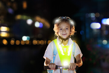 Safety on dark street. Kids reflective vest. - 780405947