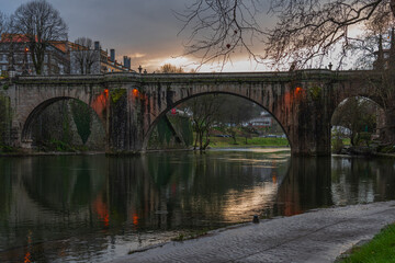 Fototapeta premium The Ponte de Sao Goncalo Bridge, Amarante Portugal. The iconic bridge is located on the Tamrga river at Amarante Portugal.