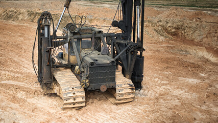 Pile driving machine. Diesel hammer pile driving machine working on construction site. Preparation...