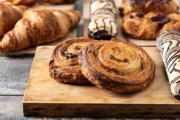 Set of bakery pastries on wooden table