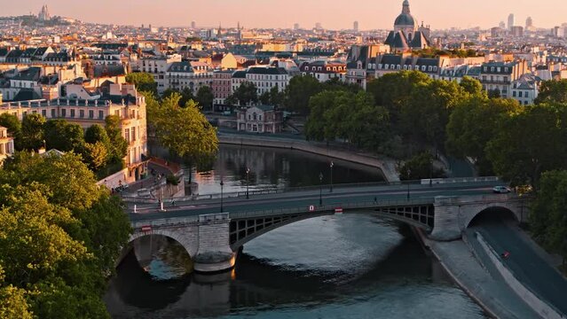 Aerial view streets of Paris, France, overlooking the famous eiffel tower of paris at sunset.