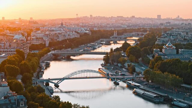 Aerial view streets of Paris, France, overlooking the famous eiffel tower of paris at sunset.