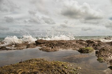 Scenic view of waves hitting the rocks on the shore of the beach on the Isle of Wight