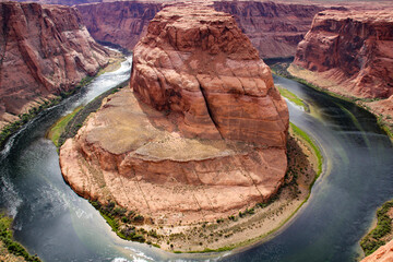 Aerial view of the Horseshoe Bend surrounded by the Colorado River in Glen Canyon, Page, Arizona, US