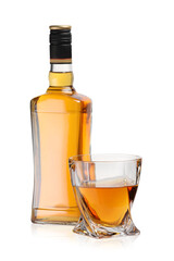 Glass and bottle of whiskey isolated on white