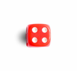 One red game dice isolated on white, top view