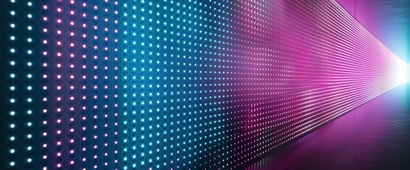Fototapeta premium Abstract background, gradient color with blue, green, and purple. A glowing screen or LED panel made of small light strips creates an abstract pattern on the wall.