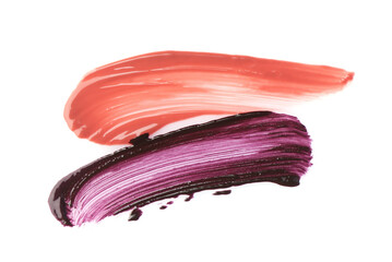 Strokes of color lip glosses isolated on white, top view