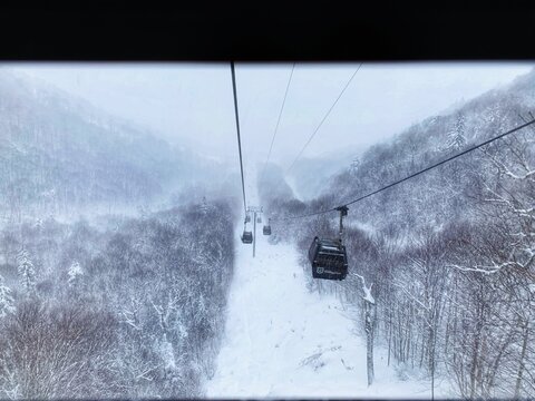 Drone shot of ropeway wagons on a hill in Killington Ski Resort, Vermont, New England, Canada
