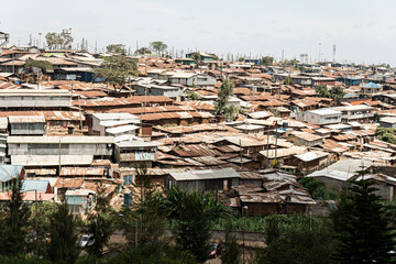 Kibera is biggest slum in Africa. Slums in Nairobi, Kenya. - obrazy, fototapety, plakaty