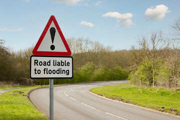 road liable to flooding road sign, uk road warning sign