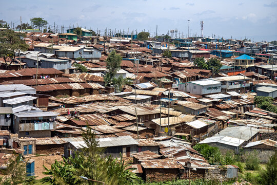 view of corrugated iron huts at the Nairobi downtown Kibera slum neighborhood, Nairobi, Kenya, East Africa, one of the largest slums in Africa