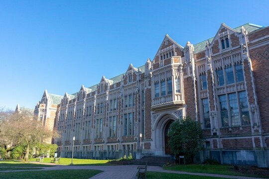 Exterior of University of Washington with garden in front of the facade under clear sky