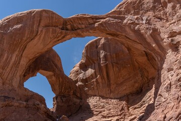 Fototapeta premium Sandstone Arch with blue sky at Arches national park in Utah - USA