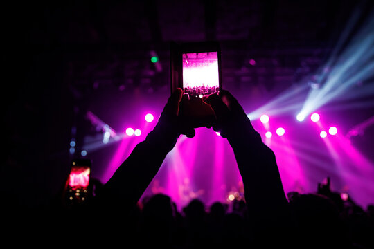 Video recording of the concert on a mobile phone or a smartphone
