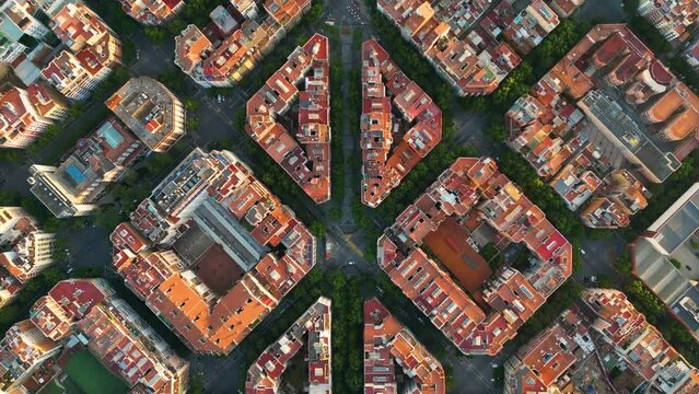 Panoramic aerial view of Barcelona cityscape with octagon buildings. Streets and blocks