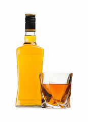 Glass and bottle of whiskey isolated on white