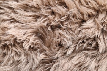Texture of faux fur as background, top view