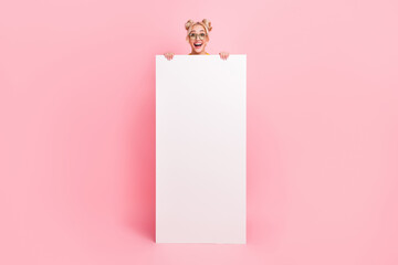 Full length photo of cute blond lady hold promo wear eyewear isolated on pink background