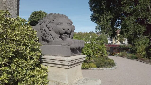 Majestic Lion Sculpture Adorning a Sunny Public Park in Epinal in France