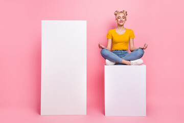 Photo of attractive pretty female advertising yoga lessons promote self care isolated on pink color background