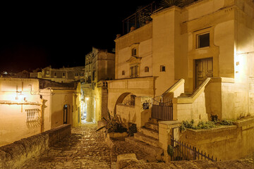 Matera street by night, Italy - 780487571