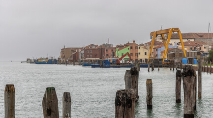 Village Sant Antonio on the island Pellestrina in Venice lagoon on a cloudy day