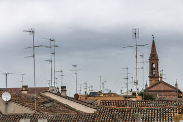 countless antennas above the roofs of Comacchio, Italy