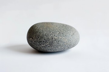 Fototapeta na wymiar A simple round pebblestone in gray color isolated on white background, realistic textured. AI Generated.