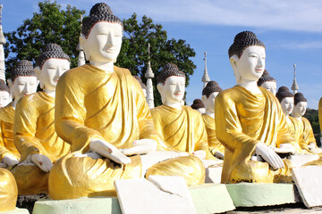 Rows of old stone statues of Buddha, Aung Setkya Paya, near to famous Bodhi Tataung temple complex, Monywa, Sagaing Region, Myanmar (Burma)