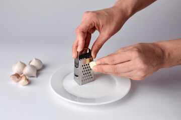 Garlic grater close-up on a plate