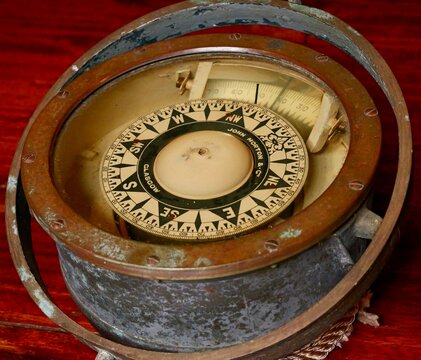 Old compass. The Pascual Flores is pailebote or goleta ship build in 1917 as part of the sailing trade fleet of Torrevieja. Escala a Castell&oacute; festival, Port Azahar, Castellon, Spain 