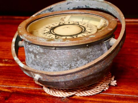 Old compass. The Pascual Flores is pailebote or goleta ship build in 1917 as part of the sailing trade fleet of Torrevieja. Escala a Castell&oacute; festival, Port Azahar, Castellon, Spain 