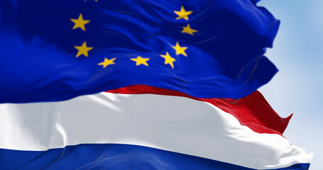 Flags of the Netherlands and the European Union waving - 780508727