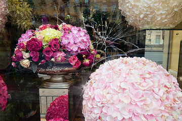 Broken glass in flower and gift shop window