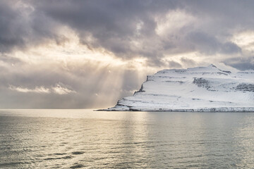 Iceland East Fiords - beams of light on the sea.