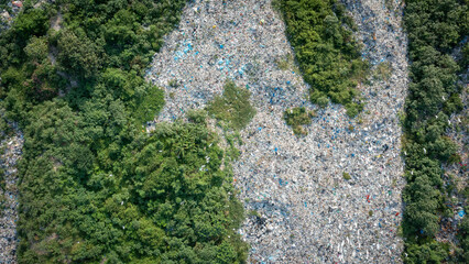 A pile of garbage in a landfill, aerial view. Concept of ecology. - obrazy, fototapety, plakaty