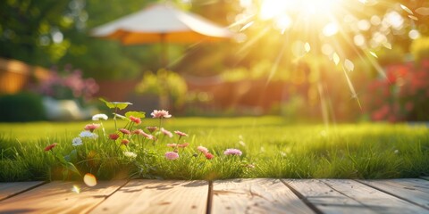 Wooden Deck Overlooking Grass and Flowers Under Sunny Sky
