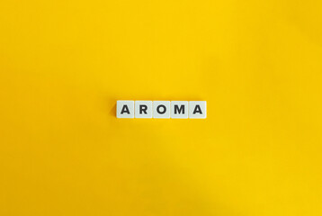 Aroma Word. Pleasant Smell, Scent, Perfume, Fragrance Concept. Text on Block Letter Tiles on Yellow...