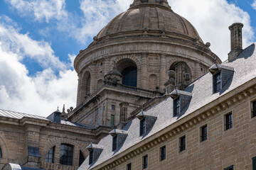 Fototapeta na wymiar Sculpted Dome of El Escorial Monastery Against the Sky