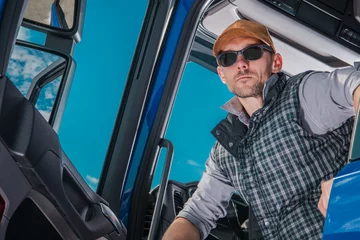 Fotobehang Modern Semi Truck Driver Portrait © Tomasz Zajda