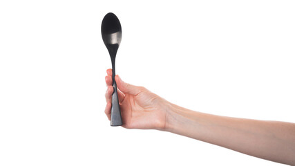Person Holding a Spoon in Hand