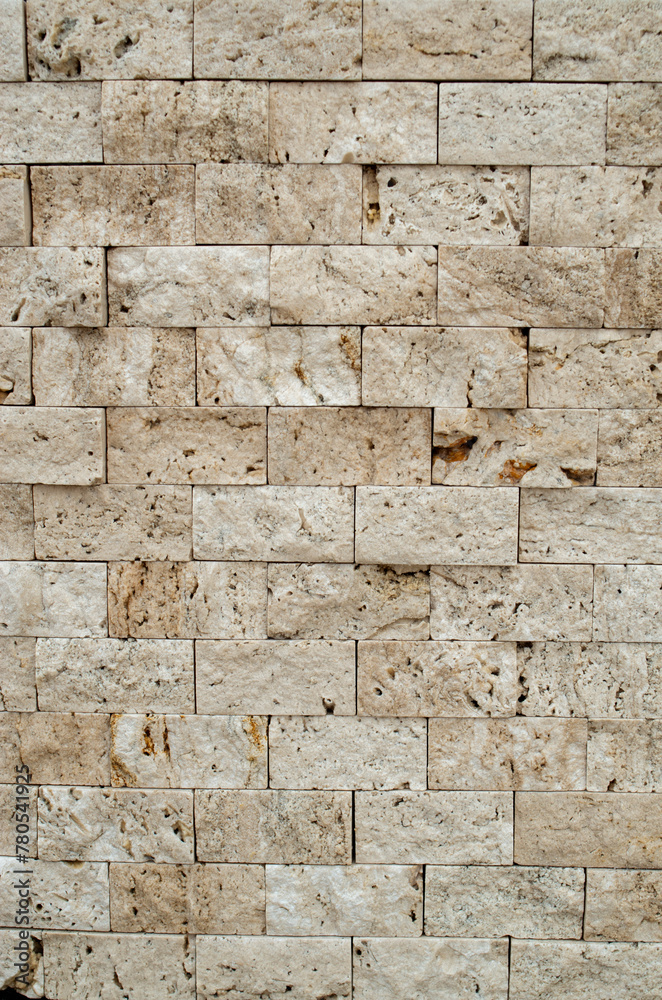 Canvas Prints New ecru decorative stone wall closeup