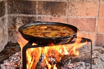 valencian paella over a wood fire