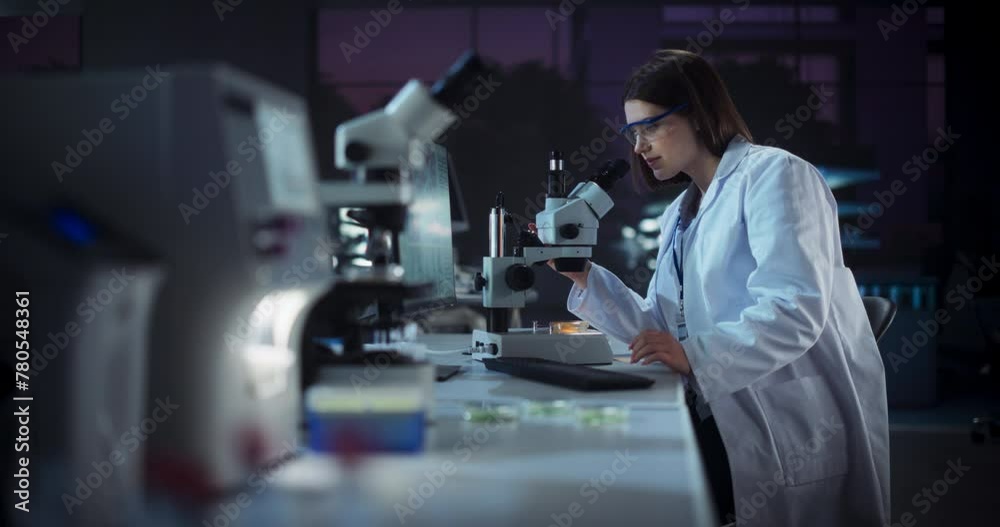 Poster cinematic footage with a beautiful young scientist making an important innovative high tech discover