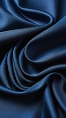 Fototapeta premium Vertical textured abstract background with indigo color silk fabric.