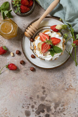 Belgian waffles with fresh berrie strawberries and ricotta cheese for breakfast on a stone background. - 780554739